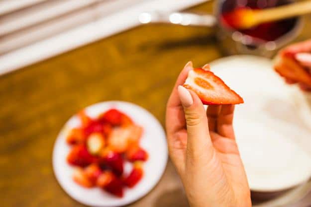 cutting-strawberries-into-half