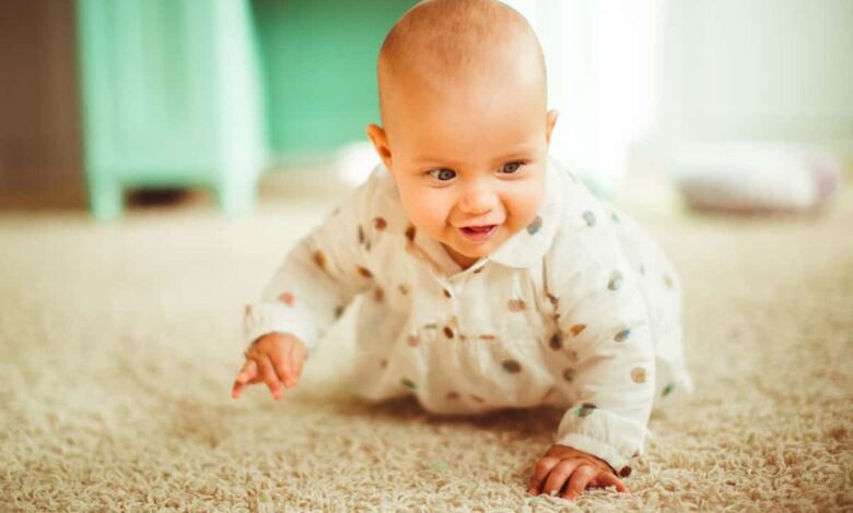 baby crawling carpet